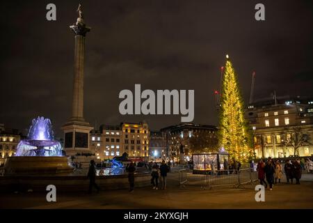 London, UK.  2 December 2022.  The annual Christmas tree has been lit in Trafalgar Square.  The tree is an annual gift from the people of Norway as a thank you for the UK’s support to Norway during the Second World War.  Credit: Stephen Chung / Alamy Live News Stock Photo