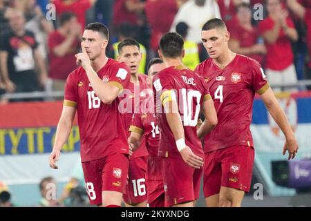 Doha, Qatar. 2nd Dec, 2022. Dusan Vlahovic (L) of Serbia celebrates his goal during the Group G match between Serbia and Switzerland at the 2022 FIFA World Cup at Stadium 974 in Doha, Qatar, Dec. 2, 2022. Credit: Li Gang/Xinhua/Alamy Live News Stock Photo