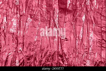 Holographic abstract magenta textured background. Stock Photo