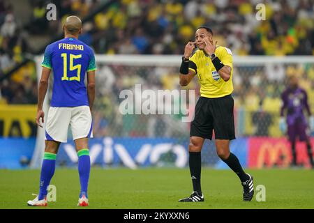 Lusail, Qatar. 02nd Dec, 2022. December 2, 2022, Lusail, Lusail, Qatar, Qatar: LUSAIL, QATAR - DECEMBER 2: Referee Ismail Elfath talks to the Player of Brazil fights Fabinho during the FIFA World Cup Qatar 2022 group G match between Brazil and Cameroon at Lusail Stadium on December 2, 2022 in Lusail, Qatar. (Credit Image: © Florencia Tan Jun/PX Imagens via ZUMA Press Wire) Credit: ZUMA Press, Inc./Alamy Live News Credit: ZUMA Press, Inc./Alamy Live News Stock Photo