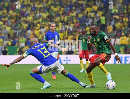 Lusail, Qatar. 2nd Dec, 2022. Karl Toko Ekambi (R) of Cameroon controls the ball during the Group G match between Cameroon and Brazil at the 2022 FIFA World Cup at Lusail Stadium in Lusail, Qatar, Dec. 2, 2022. Credit: Chen Cheng/Xinhua/Alamy Live News Stock Photo