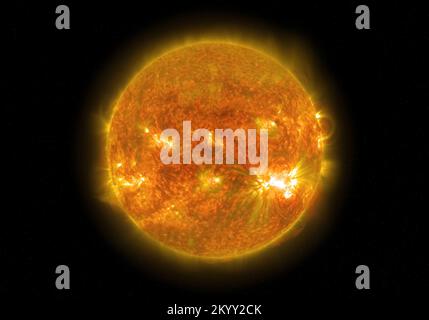 The Sun in space. The Sun is the star at the center of the Solar System. Sci-fi background. Elements of this image furnished by NASA. Stock Photo