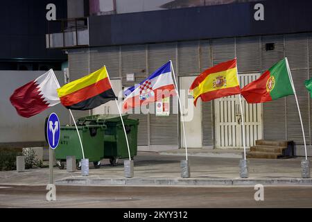 The Croatian and German flags can be seen turned upside down in front of the building in Doha, Qatar on December 2, 2022. Photo: Goran Stanzl/PIXSELL Credit: Pixsell/Alamy Live News Stock Photo