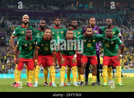 Cameroon team group (top row l-r) Eric Maxim Choupo-Moting, Moumi Ngamaleu, Christopher Wooh, AndrŽ-Frank Zambo Anguissa, goalkeeper Devis Epassy, Vincent Aboubakar (bottom row l-r) Collins Fai, Enzo Ebosse, Pierre Kunde, Bryan Mbeumo, Tolo Nouhou during the FIFA World Cup Group G match at the Lusail Stadium in Lusail, Qatar. Picture date: Friday December 2, 2022. Stock Photo