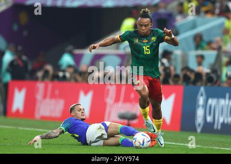 Doha, Qatar. 02nd Dec, 2022. Pierre Kunde (L) of Cameroon in action with Antony of Brazilduring the 2022 FIFA World Cup Group G match at Lusail Stadium in Doha, Qatar on December 02, 2022. Photo by Chris Brunskill/UPI Credit: UPI/Alamy Live News Stock Photo