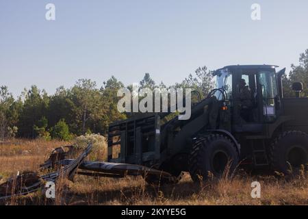 https://l450v.alamy.com/450v/2kyye5g/us-marine-corps-lance-cpl-javon-carpio-engineer-equipment-operator-marine-wing-support-squadron-mwss-273-marine-air-control-group-28-2nd-marine-aircraft-wing-operates-a-tractor-rubber-tired-articulated-steering-multipurpose-john-deere-624kr-to-salvage-parts-of-a-downed-aircraft-during-an-aircraft-recovery-training-at-the-guardian-center-georgia-nov-8-2022-while-at-the-guardian-center-marines-with-mwss-273-trained-with-base-recovery-after-attack-and-aircraft-recovery-scenarios-enabling-them-to-help-maintain-2nd-maws-combat-readiness-usmarine-corps-photo-by-lance-cpl-ky-2kyye5g.jpg