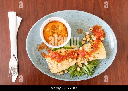 Delicious Icelandic cod fish served with vegetable in Iceland Stock Photo
