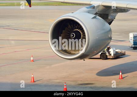 SINGAPORE - NOVEMBER 10, 2015: engine of Airbus A380 docked at Changi Airport. Singapore Changi Airport, is the primary civilian airport for Singapore Stock Photo