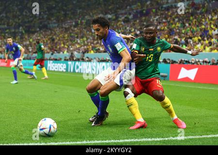 Doha, Qatar. 02nd Dec, 2022. Collins Fai (R) of Cameroon in action with Marquinhos of Brazil during the 2022 FIFA World Cup Group G match at Lusail Stadium in Doha, Qatar on December 02, 2022. Photo by Chris Brunskill/UPI Credit: UPI/Alamy Live News Stock Photo