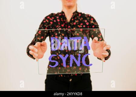 Text caption presenting Data Sync. Conceptual photo data that is continuously generated by different sources Stock Photo
