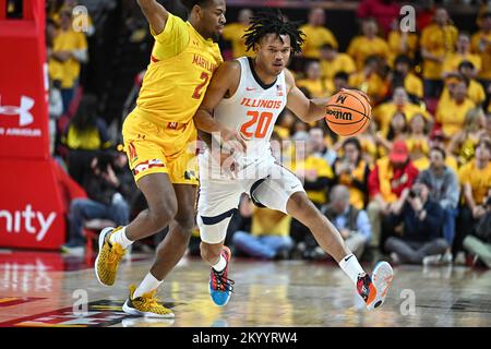 College Park, MD, USA. 02nd Dec, 2022. Illinois Fighting Illini forward Ty Rodgers (20) dribbles the ball during the NCAA basketball game between the Maryland Terrapins and the Illinois Fighting Illini at Xfinity Center in College Park, MD. Reggie Hildred/CSM/Alamy Live News Stock Photo