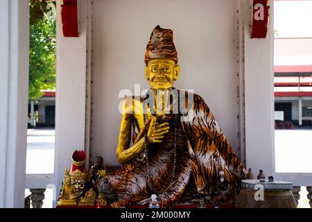 Ancient hermit or antique ruin eremite statues for thai people travelers travel visit and respect praying blessing holy mystery in Wat Thap Kradan tem Stock Photo