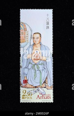 CHINA MACAO - CIRCA 2022: A stamp printed in Macau  shows The Eighteen Arhats, circa 2022. Stock Photo