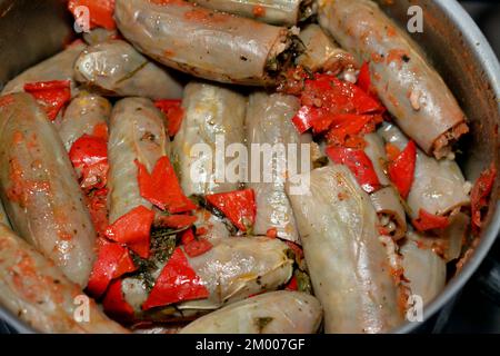 Eggplants Mahshi stuffed with white rice, onion, parsley, dill and coriander, an Arabic Egyptian traditional cuisine of white aubergine Mahshy filled Stock Photo