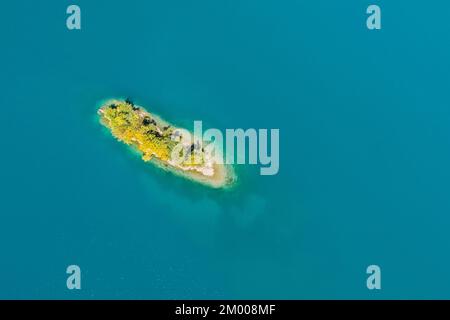 Bird's eye view of the chive island in the turquoise waters of Lake Walen in the canton of St. Gallen, Switzerland, Europe Stock Photo