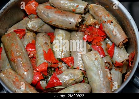 Eggplants Mahshi stuffed with white rice, onion, parsley, dill and coriander, an Arabic Egyptian traditional cuisine of white aubergine Mahshy filled Stock Photo