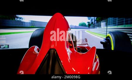 Ferrari test drive simulator cockpit seat at Ferrari museum Italy Stock Photo