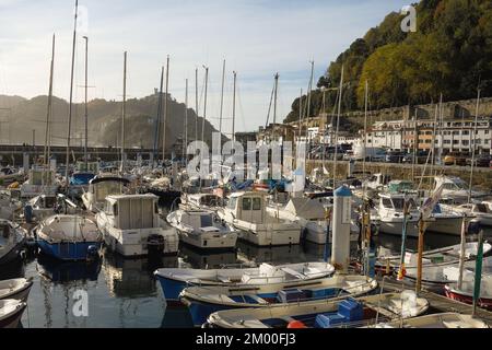 San Sebastian marina with Monte Igeldo in the background Stock Photo