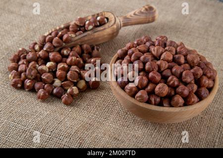 Top view of a bowl full of hazelnuts Stock Photo