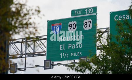 Freeway Signs to Houston and El Paso - SAN ANTONIO, UNITED STATES - NOVEMBER 01, 2022 Stock Photo