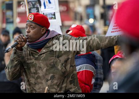 Ugandan exiles protesting outside Uganda High Commission in London. The demonstration was against the government of Uganda, which has been led Preside Stock Photo