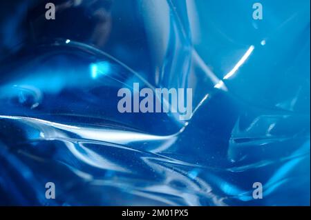blue plastic bottle crumpled, abstract macro detail Stock Photo