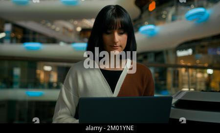 Woman working distant with laptop freelancer girl student typing computer using online web for work studying chatting in social media businesswoman Stock Photo