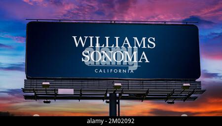 POZNAN, POL - NOV 22, 2022: Advertisement billboard displaying logo of Williams-Sonoma, an American consumer retail company that sells kitchenware and Stock Photo