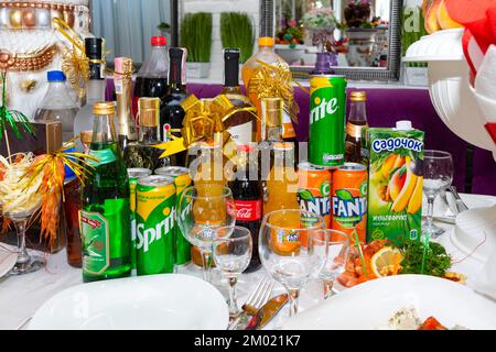 A variety of alcoholic beverages on the banquet table. Many alcoholic and non-alcoholic drinks on the festive table. Stock Photo