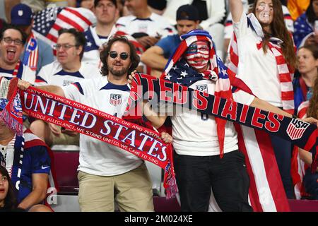 Doha, Qatar. 03rd Dec, 2022. USA fans support their team during the 2022 FIFA World Cup Group G match at Lusail Stadium in Doha, Qatar on December 02, 2022. Photo by Chris Brunskill/UPI Credit: UPI/Alamy Live News Stock Photo