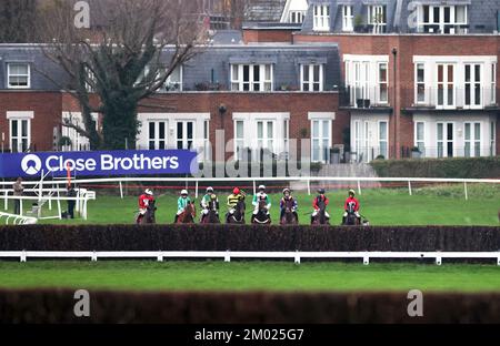 Runners and riders line up ahead of the Winners Wear Cavani Menswear London National Handicap Chase during day two of The Betfair Tingle Creek Festival at Sandown Park Racecourse, Esher. Picture date: Saturday December 3, 2022. Stock Photo