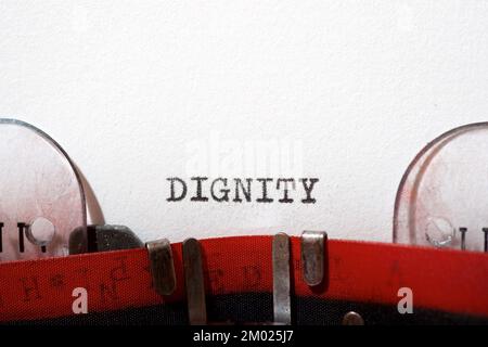 Dignity text written with a typewriter. Stock Photo