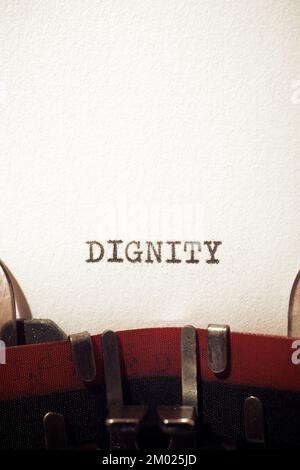Dignity text written with a typewriter. Stock Photo