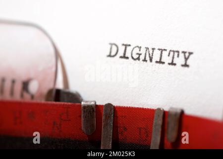 Dignity text written with a typewriter. Stock Photo