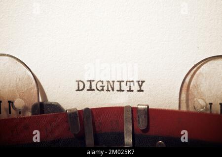 Dignity text written with a typewriter. Stock Photo