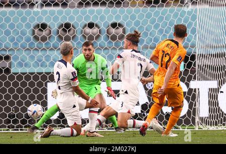 Doha, Qatar, 3rd December 2022.  Daley Blind of Netherlands scores their second goal during the FIFA World Cup 2022 match at Khalifa International Stadium, Doha. Picture credit should read: David Klein / Sportimage Stock Photo