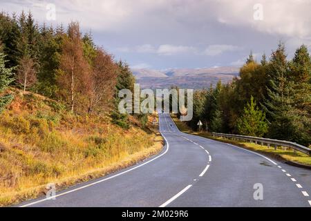 Road through Glengarry in the highlands of Scotland Stock Photo