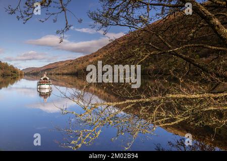 Boat on Loch Oich in the Great Glen in the highlands of Scotland Stock Photo