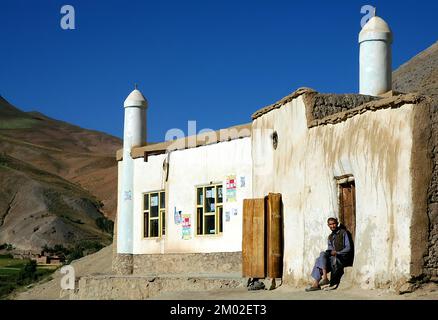 Syadara (Siyah Darah), Bamyan (Bamiyan) Province / Afghanistan: An Afghan man outside a mosque in the small town of Syadara in central Afghanistan. Stock Photo