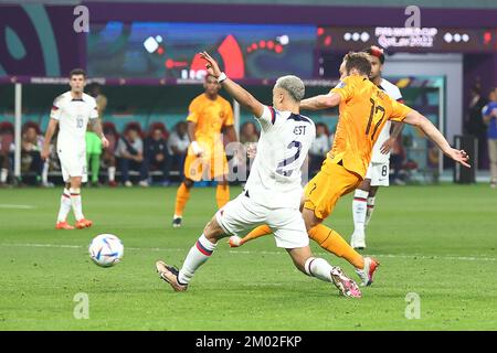 Doha, Qatar. 03rd Dec, 2022. Daley Blind of Netherlands scores his side's second goal during the 2022 FIFA World Cup Round of 16 match at Khalifa International Stadium in Doha, Qatar on December 03, 2022. Photo by Chris Brunskill/UPI Credit: UPI/Alamy Live News Stock Photo