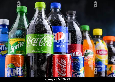 POZNAN, POLAND - OCT 28, 2021: Bottles of global soft drink brands ...