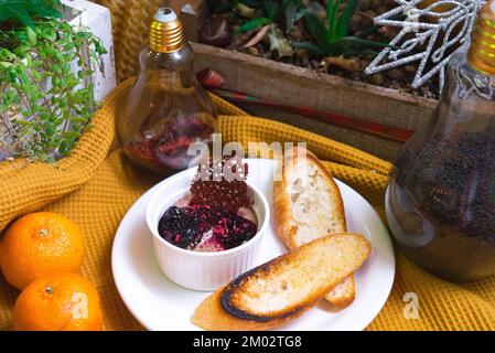 Chocolate mousse with currant jam, two slices of toasted bread Stock Photo