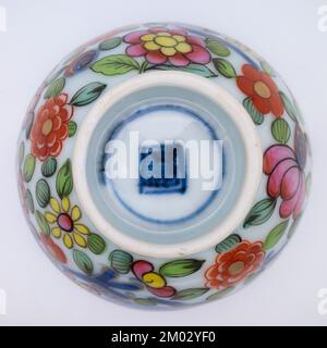 Antique Chinese Clobbered Blue and White Porcelain Dragon Tea Bowl. Qing Dynasty Stock Photo