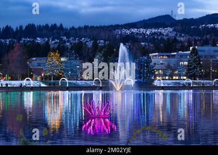 Fountain and Holiday Light display, Lafarge Lake, Town Centre Park, Coquitlam, British Columbia, Canada. Stock Photo