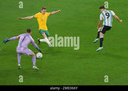 Argentina's Julian Alvarez (right) scores their side's second goal of the game during the FIFA World Cup round of 16 match at the Ahmad Bin Ali Stadium in Al Rayyan, Qatar. Picture date: Saturday December 3, 2022. Stock Photo