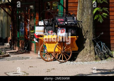 Zakopane, Poland - September 12, 2016: Commemorative bags with sewn regional patterns put on sale at the stall that is located by the Krupowki Street Stock Photo