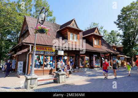 Zakopane, Poland - September 12, 2016: Formerly residential building, nowadays commercial building that is dated from approx in 1900, located by the K Stock Photo
