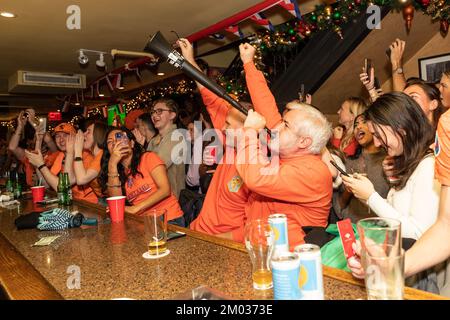 New York, USA. 03rd Dec, 2022. Fans of The Netherlands football team celebrate victory in the game against USA at Qatar World Cup at Hurley's Saloon in New York on December 3, 2022. By winning the game, team The Netherlands progressed to the quarterfinal and will play either Argentina or Australia team who play each other later in the day. (Photo by Lev Radin/Sipa USA) Credit: Sipa USA/Alamy Live News Stock Photo