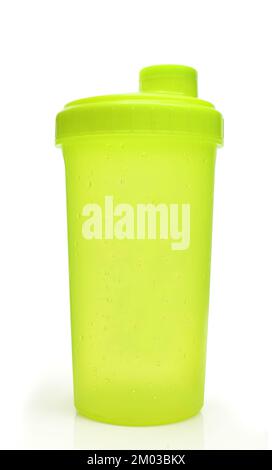 Green wet shaker isolated on white background. Plastic empty liquid container Stock Photo
