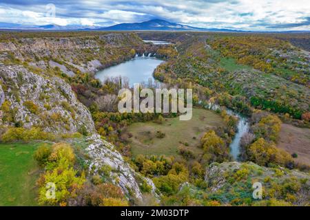 Aerial view on Brljan Lake and Brljan waterfall in Krka National park in Croatia in autumn Stock Photo